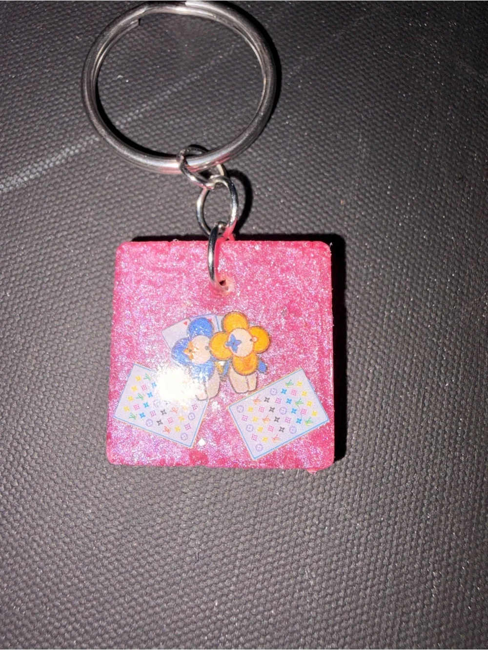 Fashion inspired. Pink Glitter Square Keychain with Flower and Bear Design